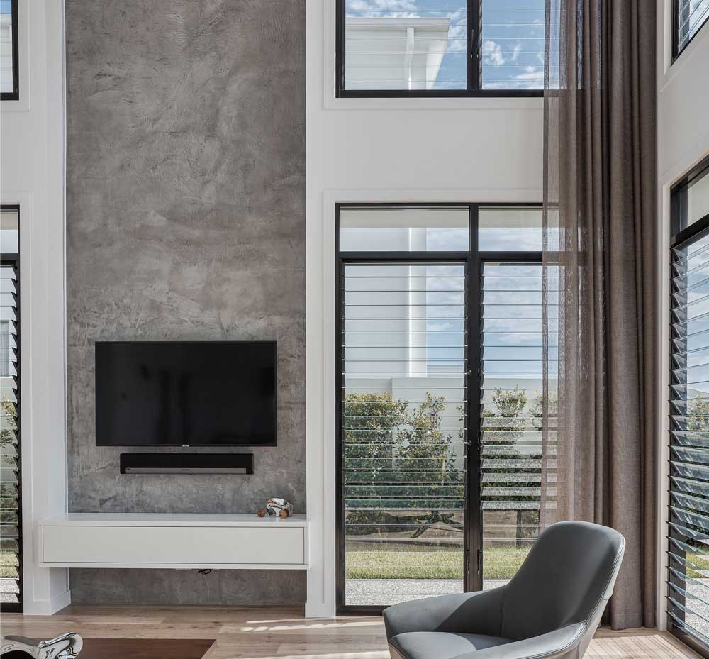 Lounge room with louvre windows